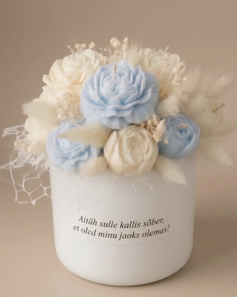Candle bouquet with light blue and cream flower candles and a personal message to a friend on the box